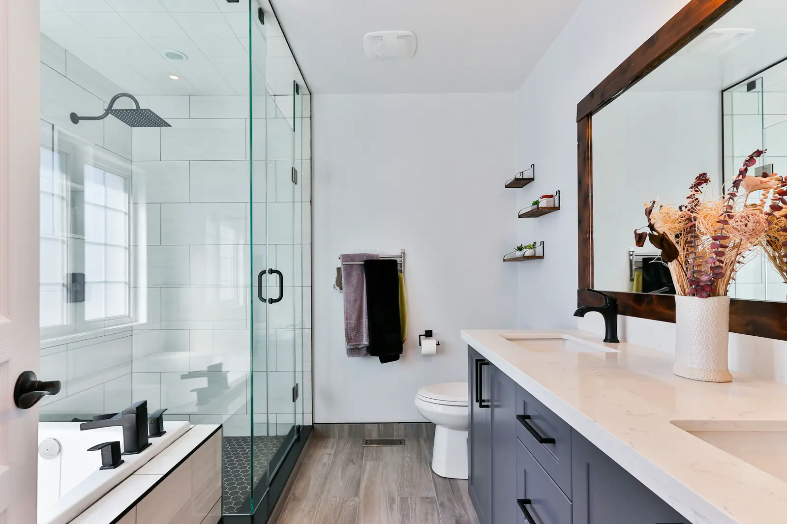 Stock photo of a bright bathroom with a soaking tub, used to illustrate lost hot water and heater repair